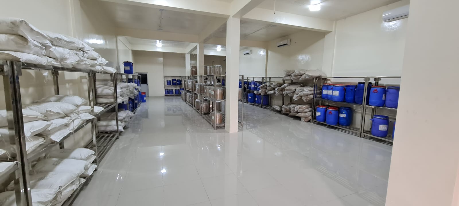 Raw material store with stainless steel racking