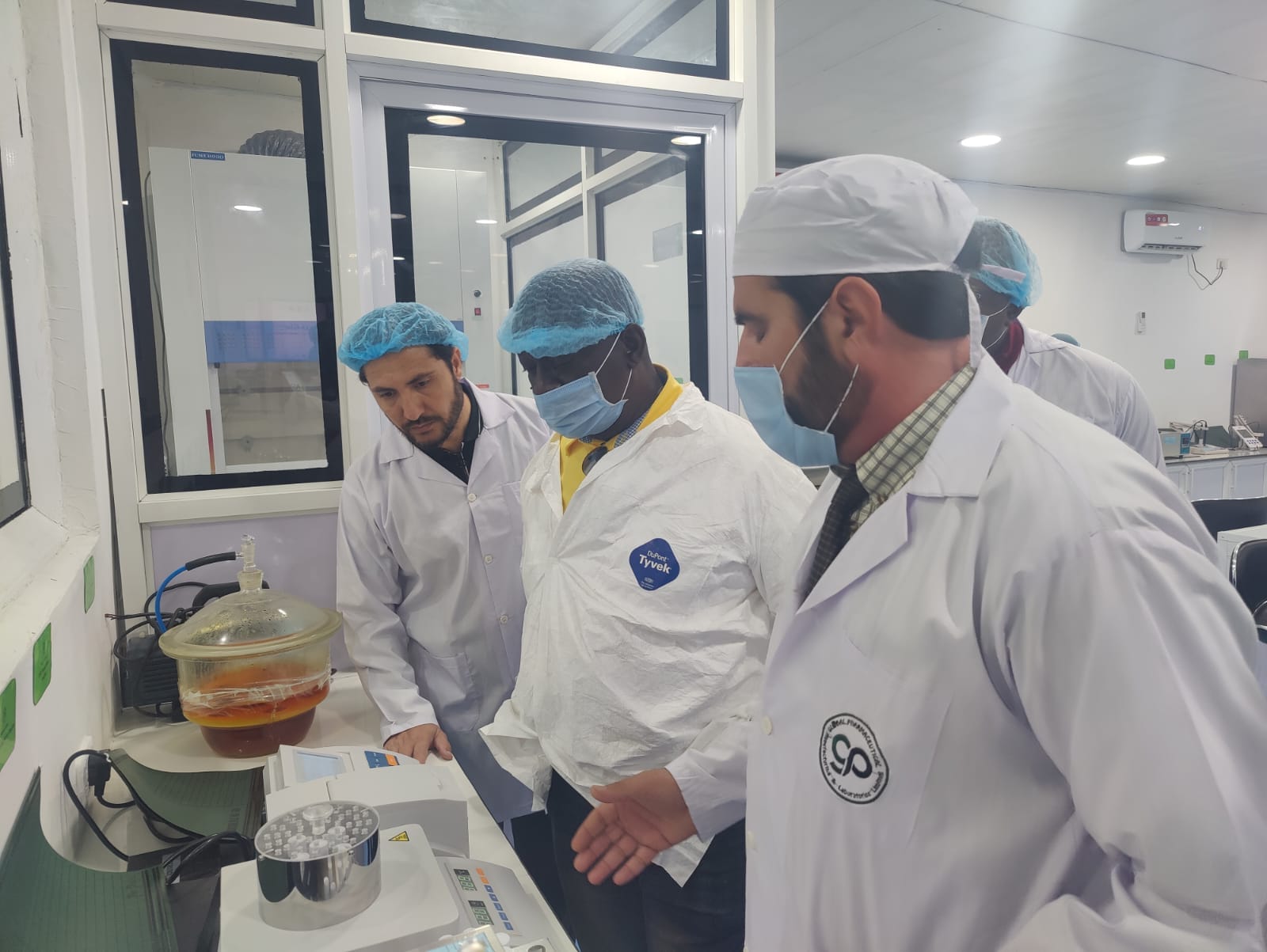 Analysts reviewing sample results